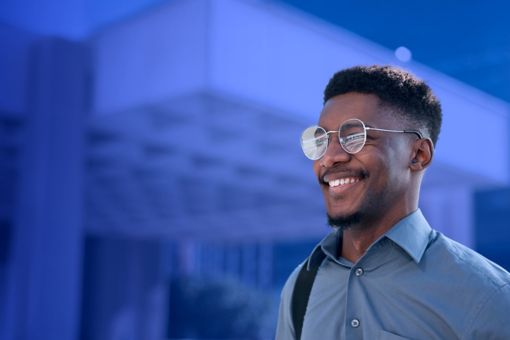 business men look into the distance with a smile