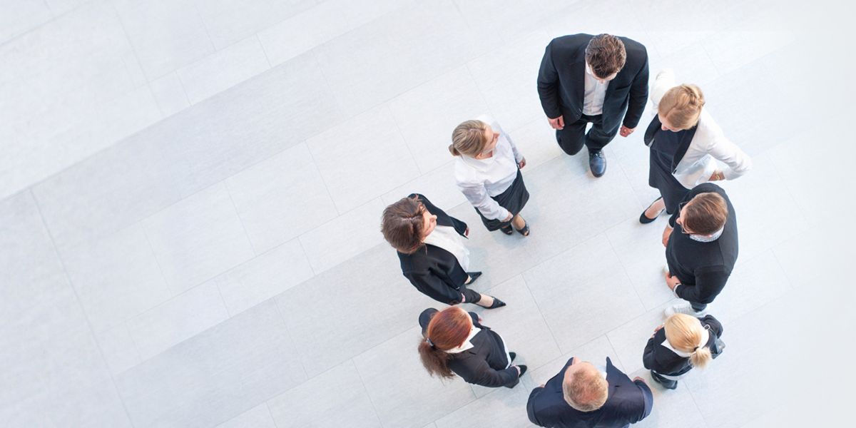 business people team forming circle