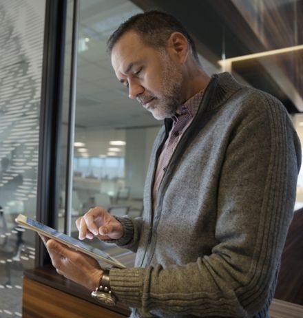 Businessman using digital tablet in office