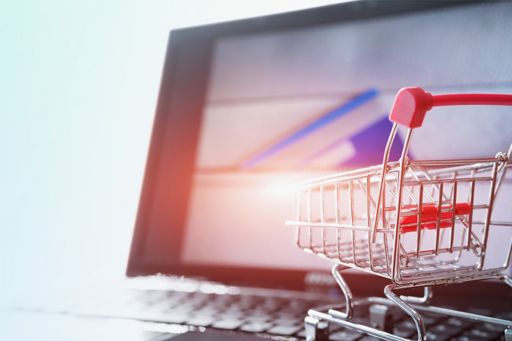 shopping cart trolley on laptop